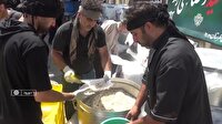 پخت و توزیع ۷۲ دیگ غذا به یاد شهدای کربلا و ایران در دورود لرستان